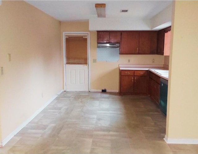 kitchen featuring black dishwasher and sink