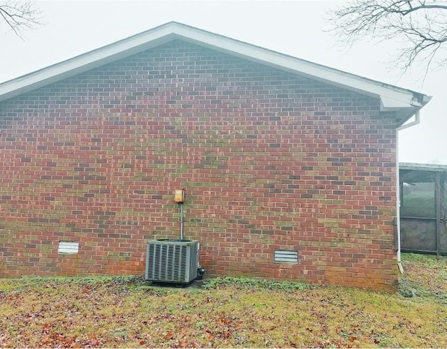 view of home's exterior with central air condition unit