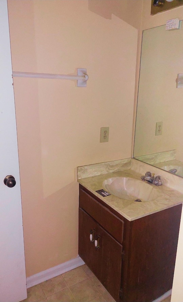 bathroom featuring vanity and tile patterned flooring