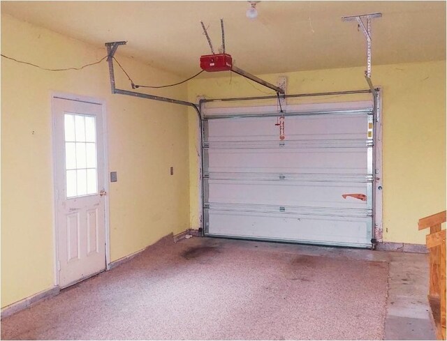 garage featuring a garage door opener