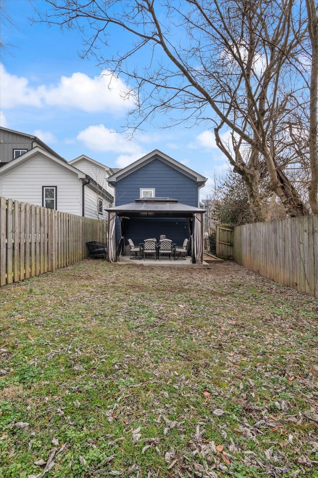 rear view of property with a patio area