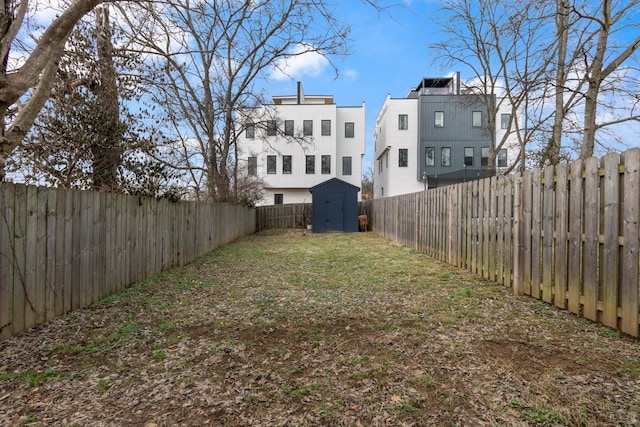 view of yard with a storage shed