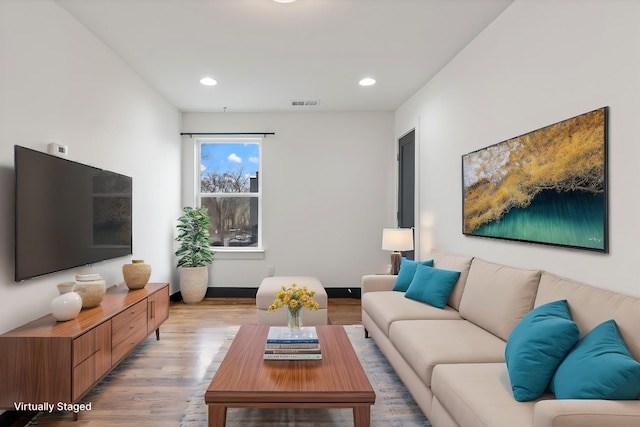 living room featuring light hardwood / wood-style flooring