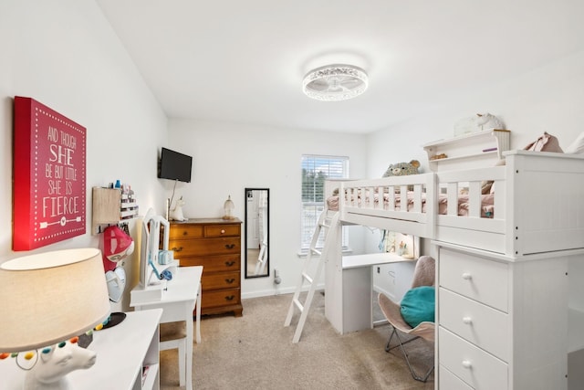 bedroom with light colored carpet