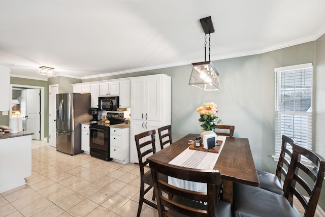 dining area featuring crown molding and light tile patterned flooring