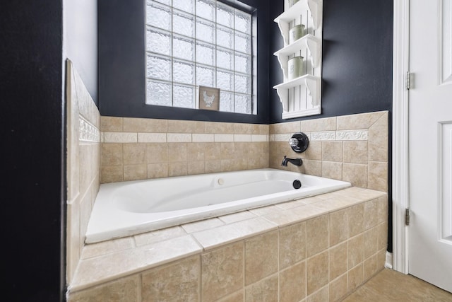 bathroom featuring a relaxing tiled tub