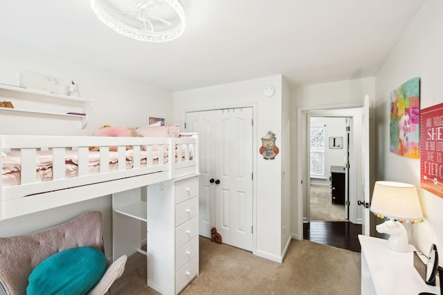 bedroom featuring carpet floors and a closet