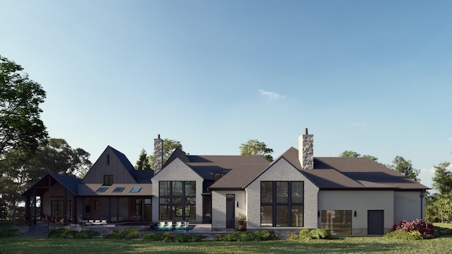 view of front of house with a patio area and a front lawn