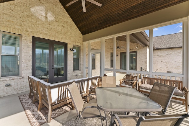 view of patio / terrace featuring french doors, outdoor dining area, and ceiling fan