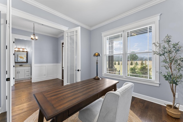 dining space with ornamental molding, wainscoting, baseboards, a chandelier, and dark wood-style flooring