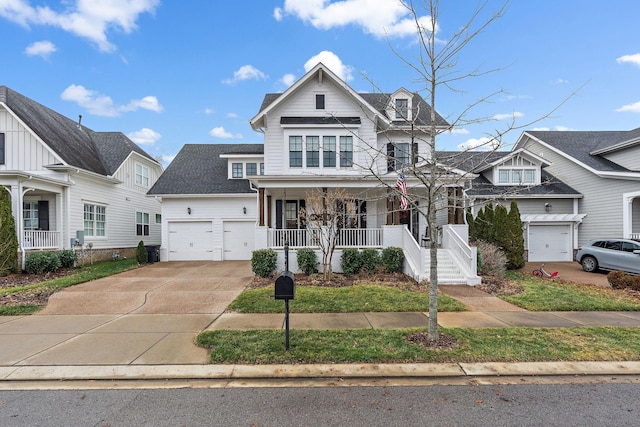 view of front of house with a garage and covered porch