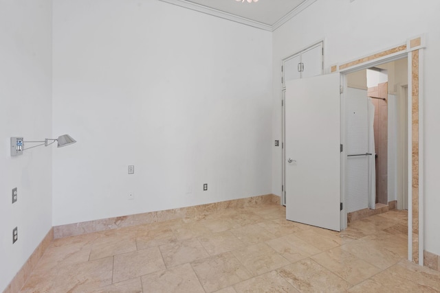 unfurnished bedroom with crown molding