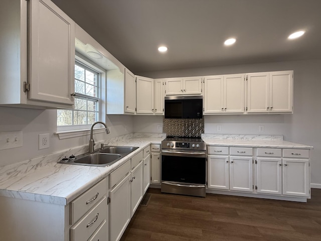 kitchen featuring white cabinets, sink, stainless steel range with electric cooktop, and dark hardwood / wood-style floors