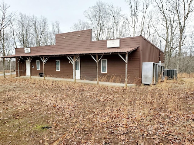 view of front of home with cooling unit