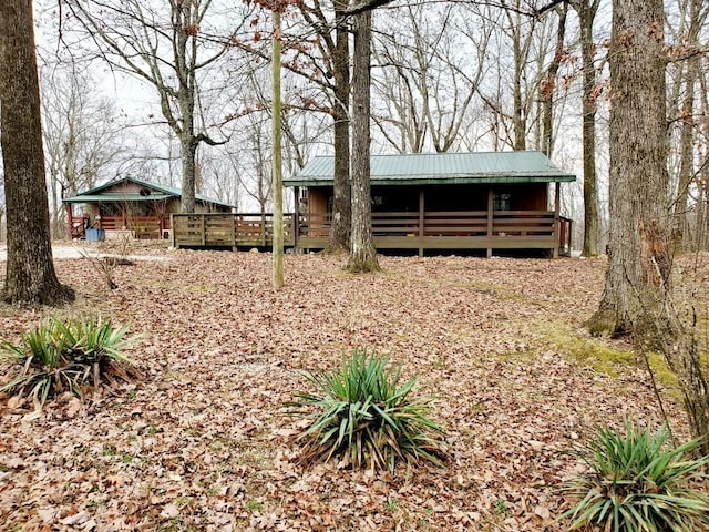 view of yard featuring a wooden deck