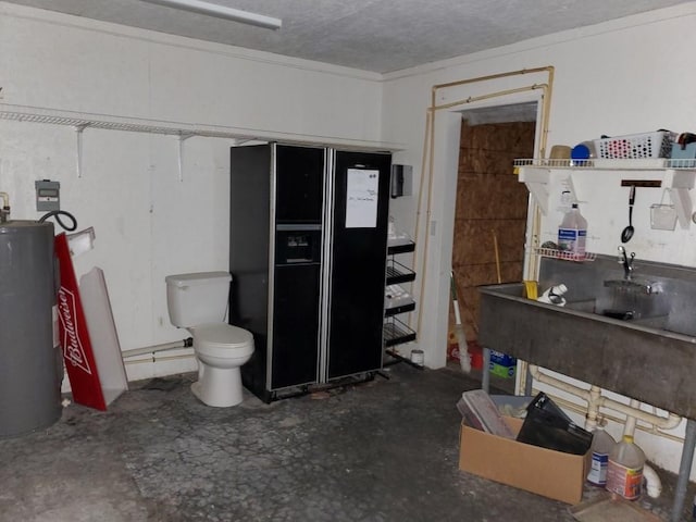 interior space with water heater and a textured ceiling