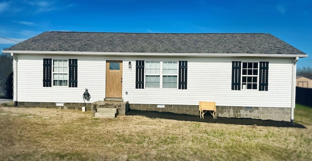 manufactured / mobile home with a front lawn