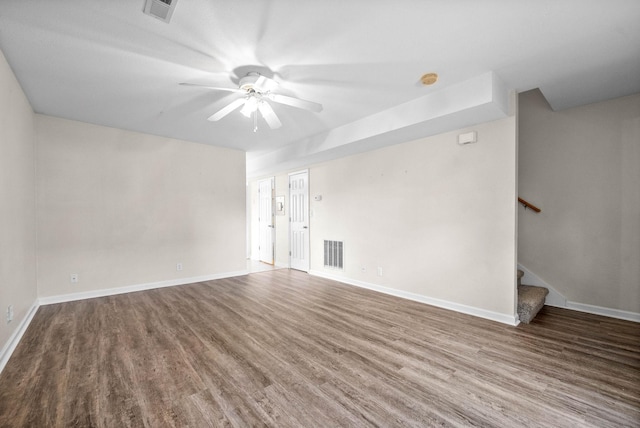 unfurnished room with wood-type flooring and ceiling fan