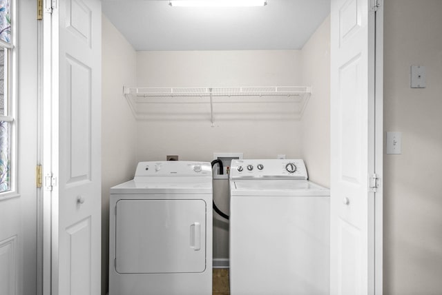 washroom featuring independent washer and dryer