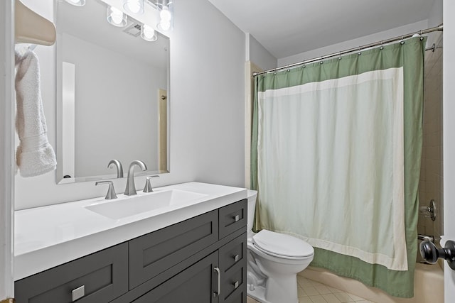 full bathroom with vanity, tile patterned floors, toilet, and shower / bathtub combination with curtain