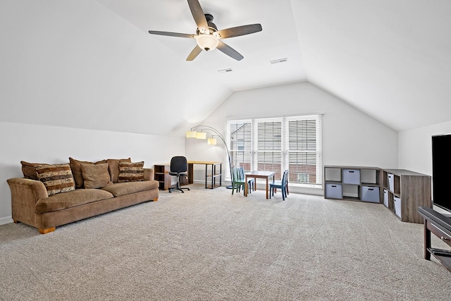 game room with vaulted ceiling, light colored carpet, and ceiling fan