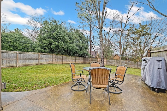 view of patio with a grill