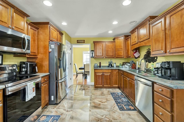 kitchen with appliances with stainless steel finishes and sink