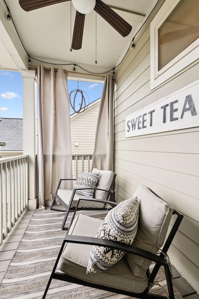 balcony featuring ceiling fan