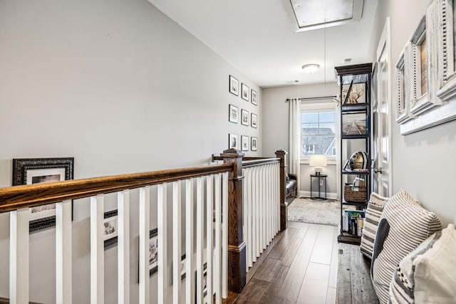 hallway with dark wood-type flooring