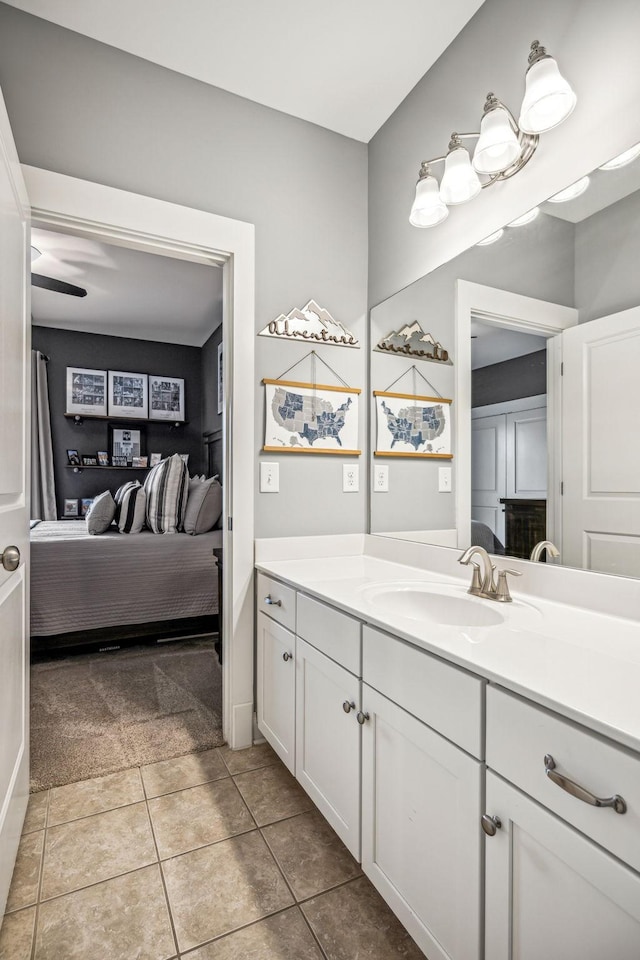 bathroom with tile patterned floors and vanity