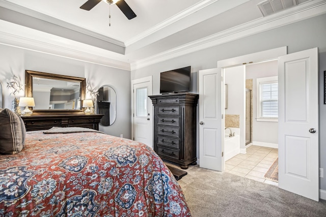 carpeted bedroom with a raised ceiling, ornamental molding, and ceiling fan