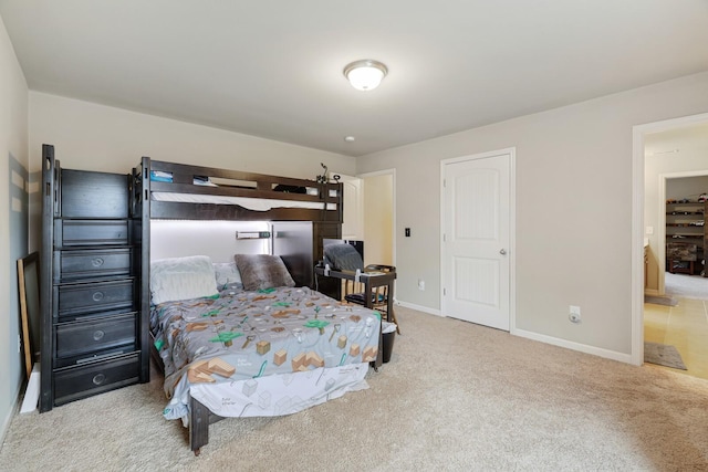 bedroom with light colored carpet