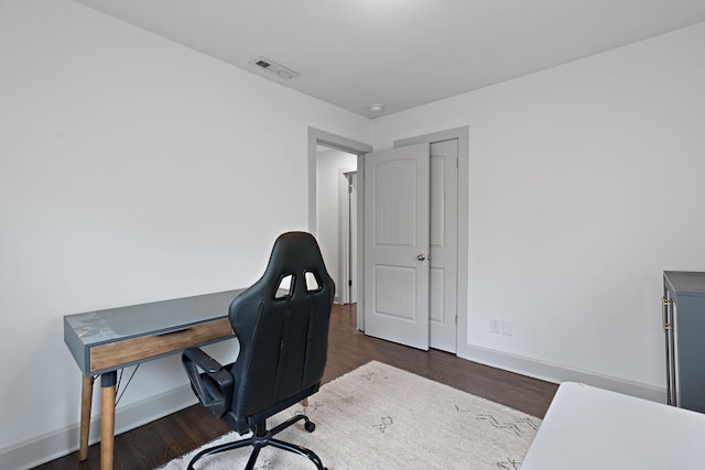 home office featuring dark hardwood / wood-style floors