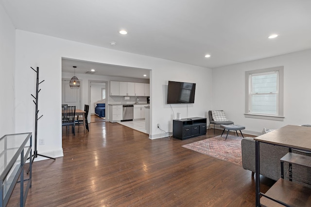 living room with dark wood-type flooring