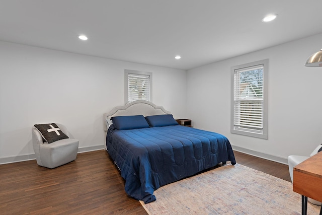 bedroom featuring dark hardwood / wood-style flooring