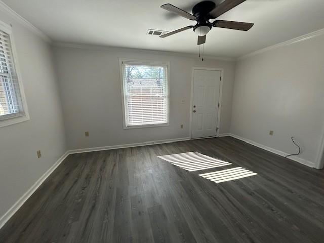 unfurnished room with dark hardwood / wood-style flooring, crown molding, and ceiling fan