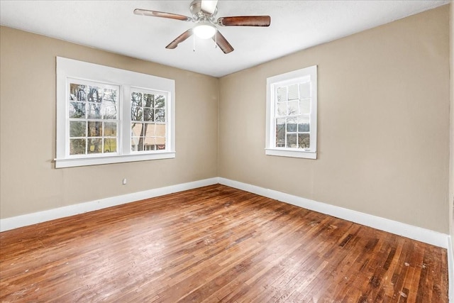 unfurnished room featuring ceiling fan and wood-type flooring