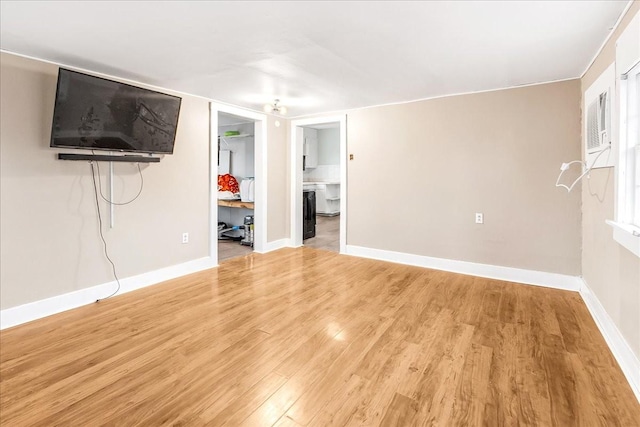 unfurnished living room with light hardwood / wood-style floors