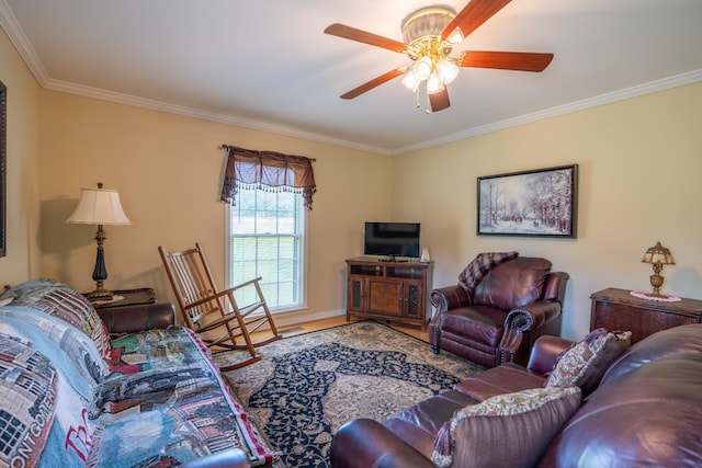 living room with crown molding and ceiling fan