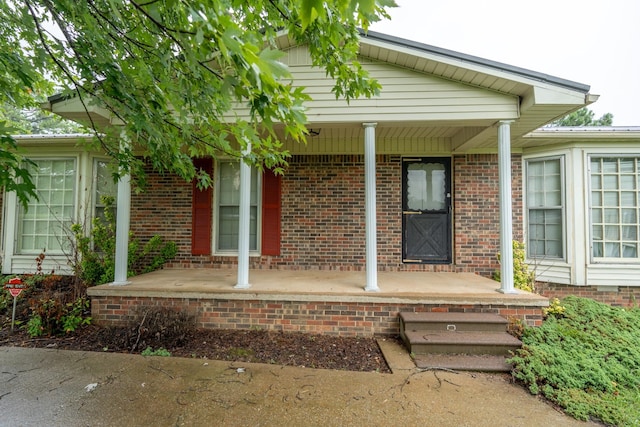 property entrance with a porch