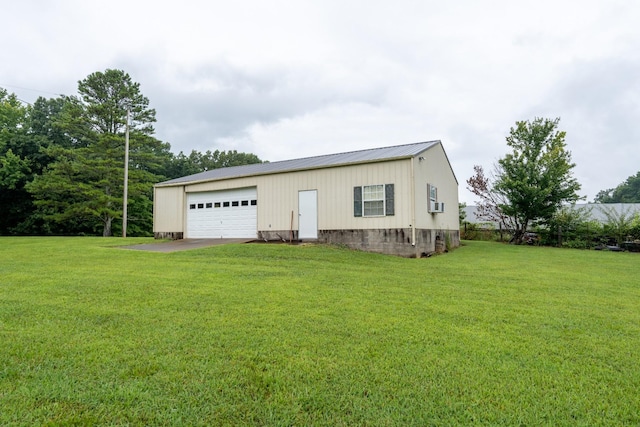 garage featuring a yard