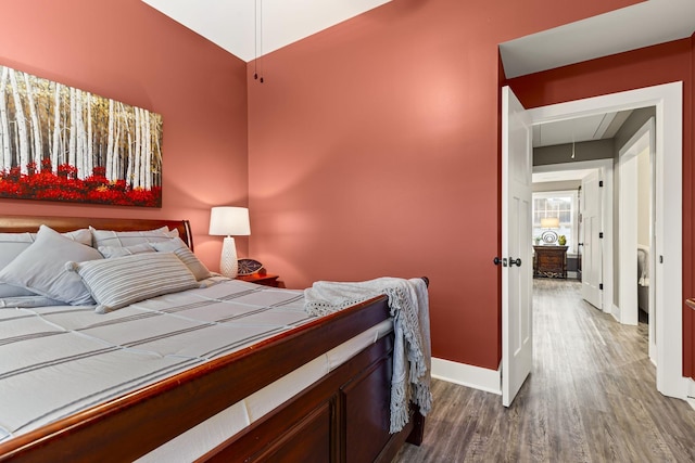 bedroom featuring hardwood / wood-style floors