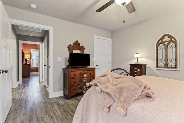 bedroom featuring dark wood-type flooring and ceiling fan