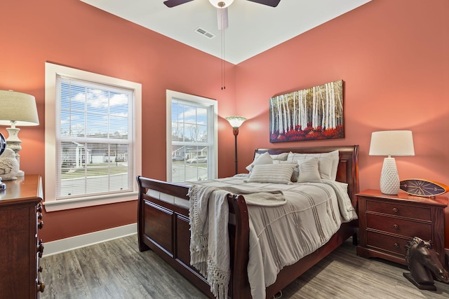 bedroom featuring wood-type flooring and ceiling fan