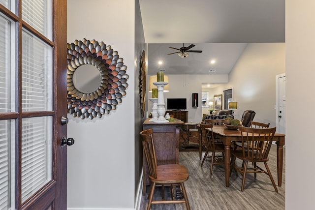 dining room featuring ceiling fan and hardwood / wood-style floors