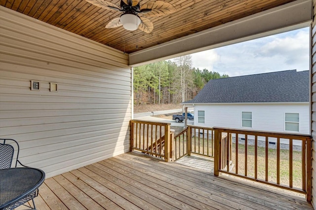 wooden deck with ceiling fan