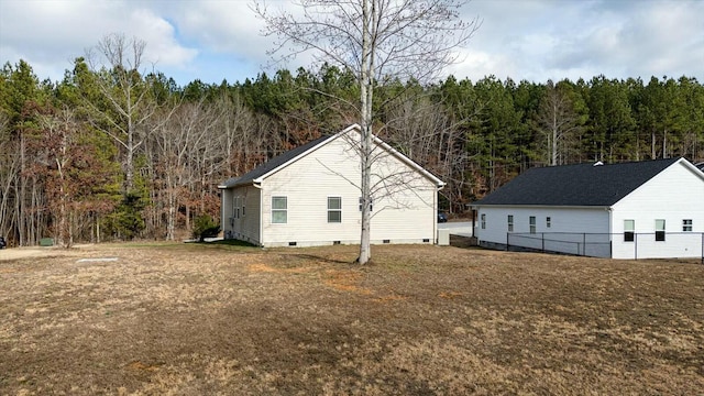 view of home's exterior featuring a lawn