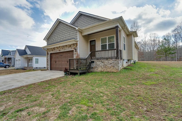 view of front facade with a garage and a front lawn