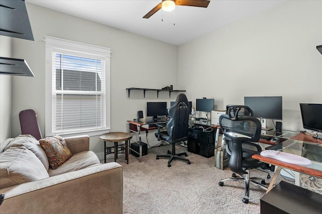 office area featuring light colored carpet and ceiling fan