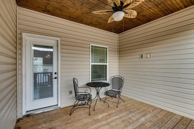 wooden deck with ceiling fan